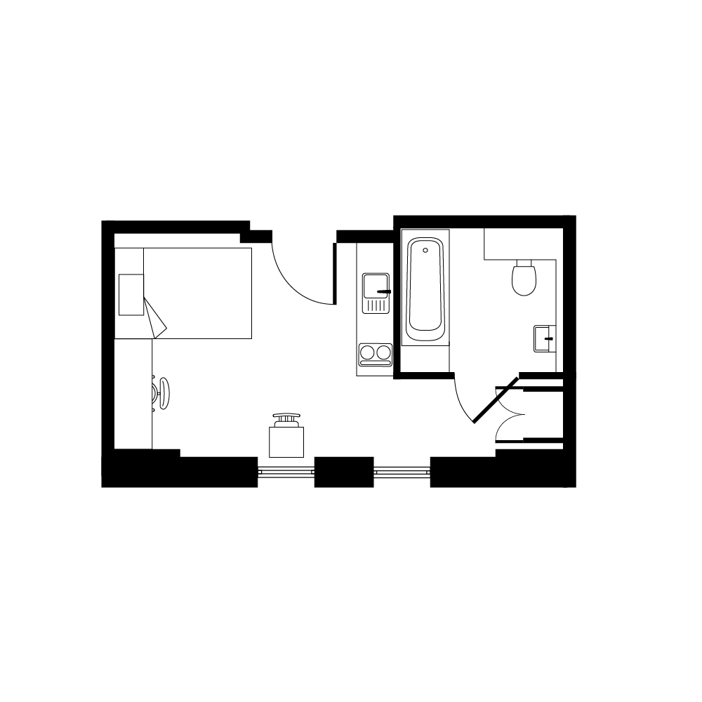 Charming studio apartment floor plan showcasing open living space and modern bathroom amenities.