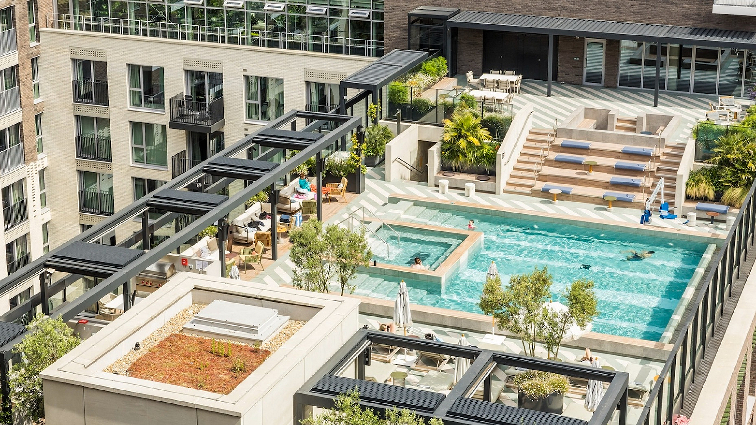 Luxurious urban rooftop with inviting pool, modern pergolas, and lush greenery offering a serene escape.