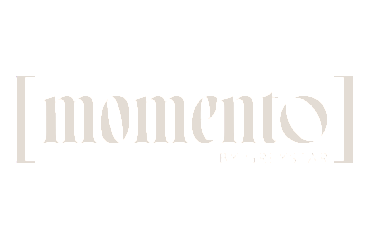 Elegant branding image displaying 'Momento by Greystar' in sophisticated typography, highlighting luxury living.